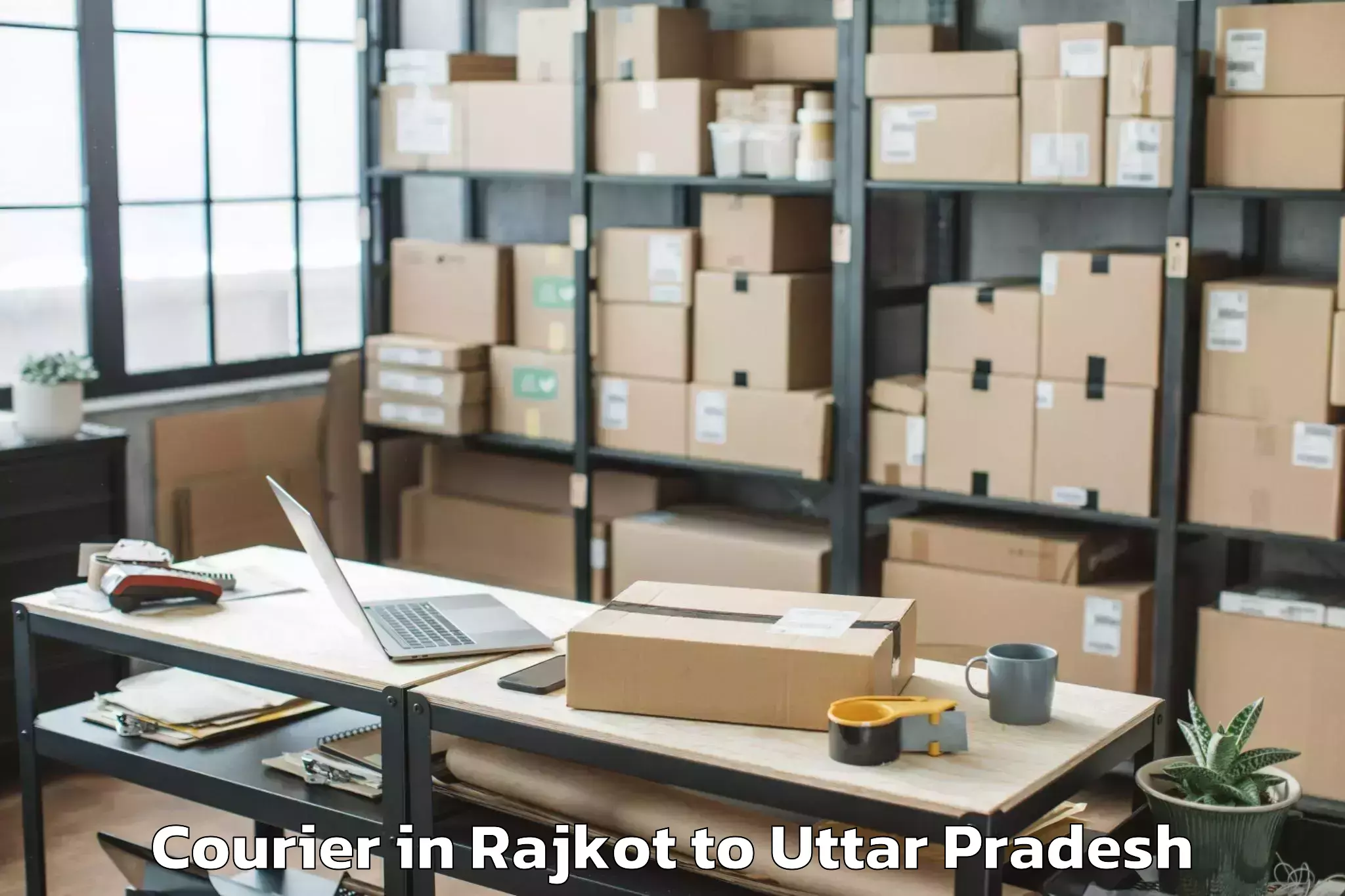 Professional Rajkot to Rani Lakshmi Bai Central Agric Courier